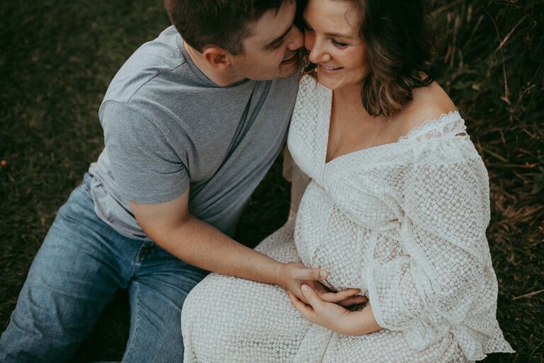 Celebrate the journey of parenthood with Durham maternity photographer, Victoria Vasilyeva Photography. Witness the love and anticipation of an expecting couple amidst the picturesque beauty of Crabtree Lake Park near Durham NC.