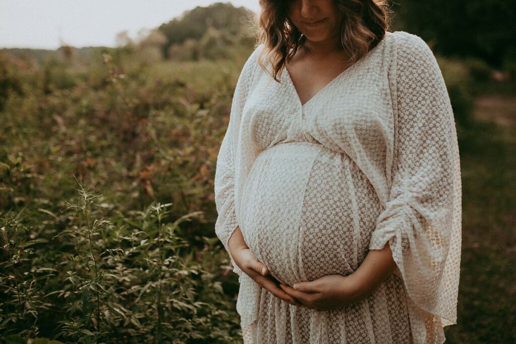 Victoria Vasilyeva Photography brings you the essence of maternal bliss in this outdoor maternity shoot. Join a beautiful mom-to-be at Crabtree Lake Park near doula Durham NC.