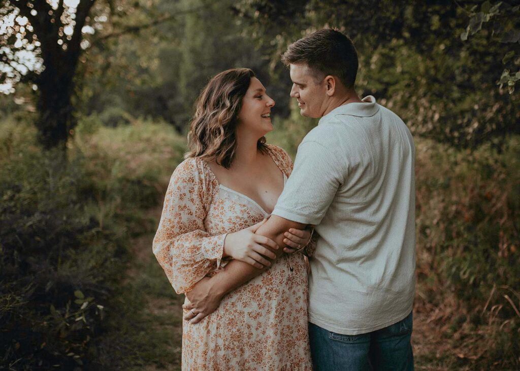 Experience the love and anticipation of parenthood in every click of Victoria Vasilyeva Photography's lens. Explore this outdoor maternity session featuring a radiant couple near Fayetteville doulas.