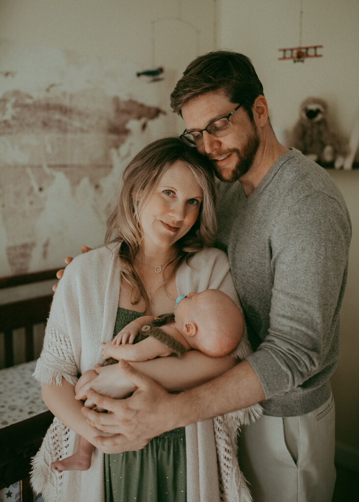 Newborn photographer in Cary, NC. Victoria Vasilyeva Photography specializes in lifestyle photography, using natural light. Certified, insured, professional, safety. All outfits for baby, mom, and siblings are provided.
