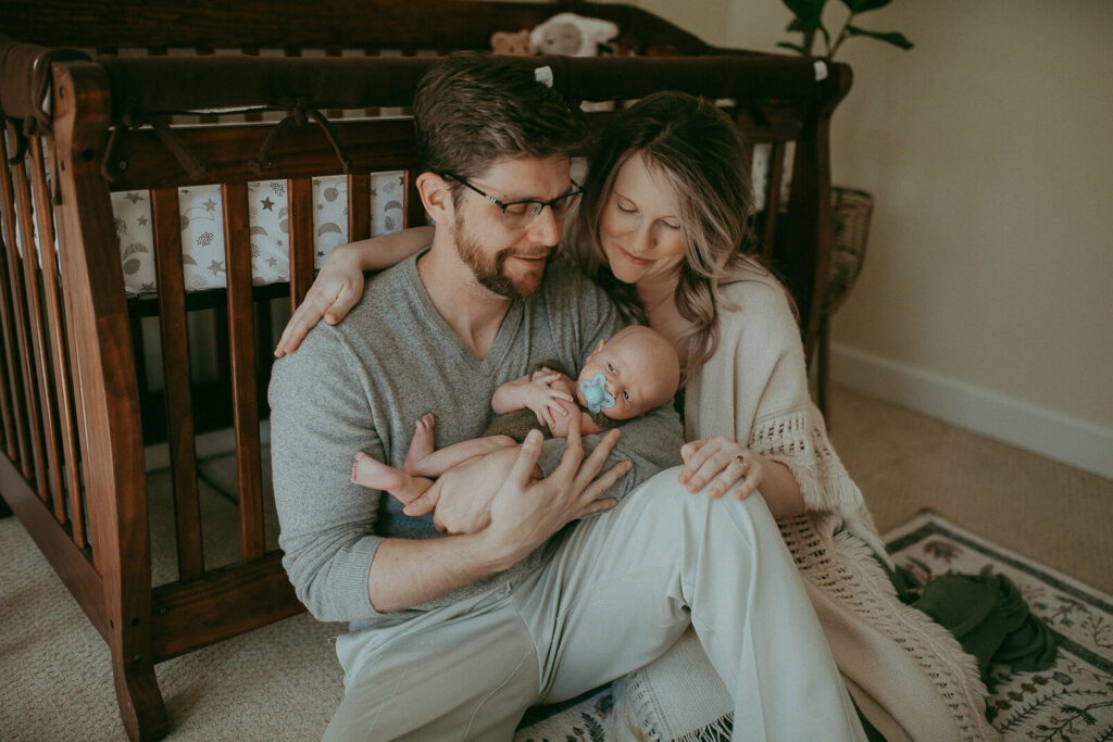 Newborn photographer in Cary, NC. Victoria Vasilyeva Photography specializes in lifestyle photography, using natural light. Certified, insured, professional, safety. All outfits for baby, mom, and siblings are provided.