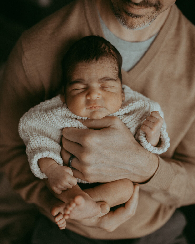 Newborn portrait session with baby boy and his family. Victoria Vasilyeva Photography - Certified, insured, and professional baby photographer in Greensboro. All outfits for baby, mom, and siblings are provided.