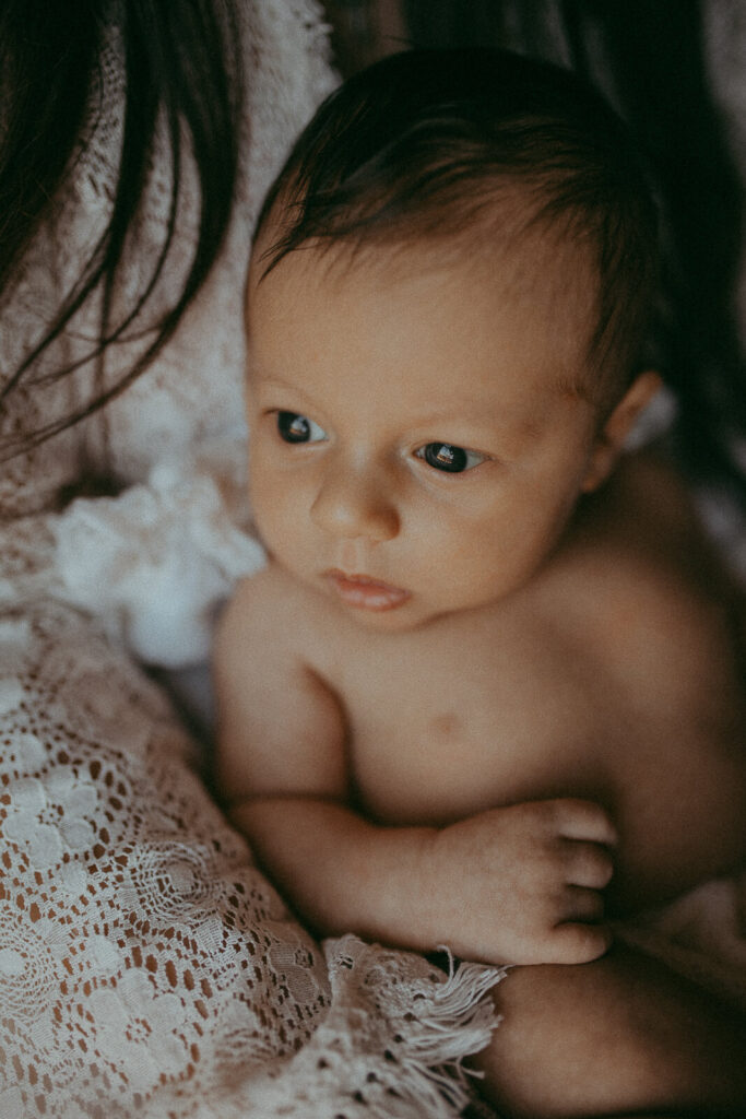 Natural light and boho inspiration: A Raleigh baby photographer captures the wonder of 20-day-old Matthew at home.