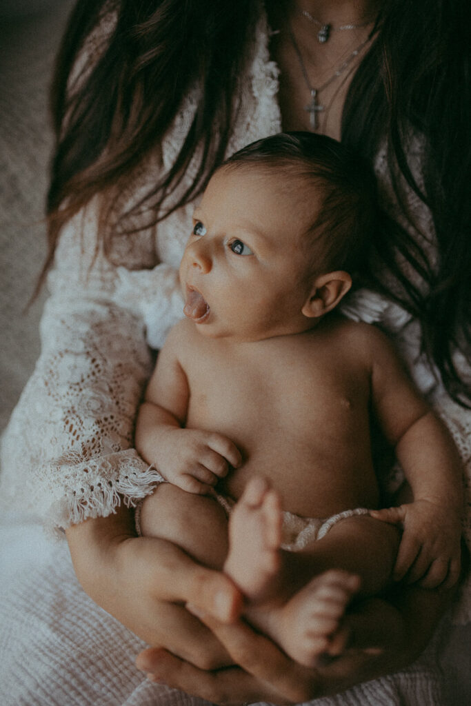Natural light and boho inspiration: A Raleigh newborn photographer captures the wonder of 20-day-old Matthew at home.