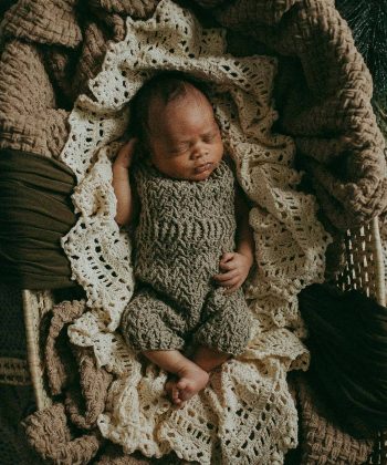 newborn baby boy sleeps in woven basket in cary nc